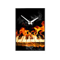 Horloge Clavier de piano en feu